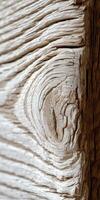 A close up of a wood panel with a face photo