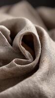 Soft fabric background featuring a swirling, textured design photo