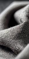 Close-up view of textured fabric showcasing intricate weaving patterns photo
