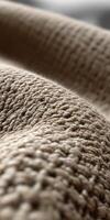 Soft woven fabric background showcasing intricate texture patterns photo
