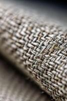 Close-up of textured fabric showcasing intricate woven pattern photo