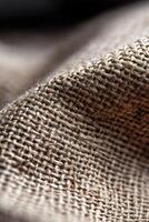 Textured fabric background with intricate weaving patterns photo