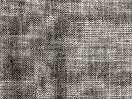 Neutral fabric background with subtle texture for design purposes photo