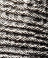 Detailed fabric texture showcasing weaving pattern and fibers photo
