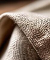 Beige fabric detail showcasing texture and softness in natural light photo