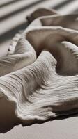 Soft fabric surface with gentle folds and natural light effects photo