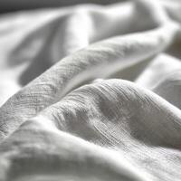 Textured white fabric background showcasing natural draping photo