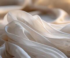 Soft fabric draping in gentle folds on a warm background photo