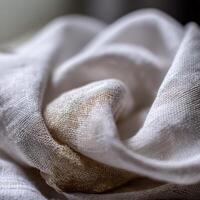 Soft fabric folds form a delicate floral arrangement on display photo