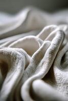 Soft, textured fabric drapes create a serene atmosphere indoors photo