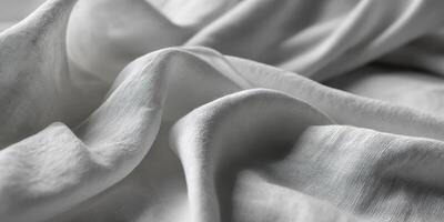 Soft white fabric creates elegant drape in a natural light setting photo