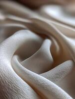 Delicate fabric draping with elegant folds and subtle textures photo