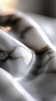 A close up of a marble surface with a white background photo