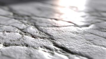 A close up of a white surface with some cracks photo
