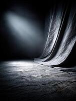 Soft light casts shadows on a textured studio backdrop creating atmosphere photo