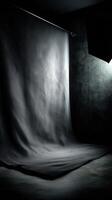 Dark studio backdrop creates a dramatic atmosphere for creative shoots photo