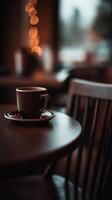 Warm coffee cup on a wooden table in a cozy interior setting photo