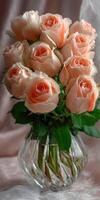 Roses in a clear vase brighten up any room photo