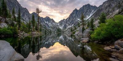 Majestic mountain lake reflecting evening sky photo