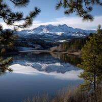 Majestic mountain reflection over tranquil lake photo