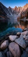 Lake reflecting mountains and trees photo