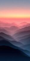 Mountains create vibrant hues during sunset photo