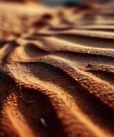 Rippling patterns of sand in a desert landscape photo