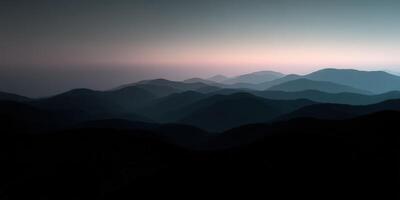 Mountains transition from day to twilight photo