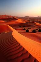 Sunset over majestic sand dunes in desert landscape photo