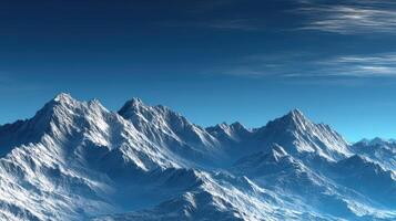 Mountain range under a clear blue sky at dawn photo