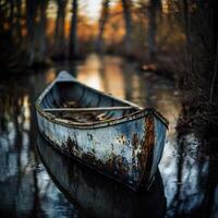 Abandoned boat rests in tranquil forest waters photo