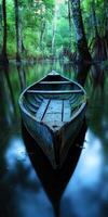 Serene boat on a tranquil river in a lush forest photo