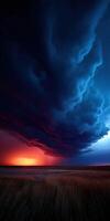 Dark clouds gather over a vibrant sunset sky photo