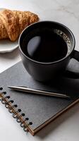 Enjoying coffee and pastry during morning routine photo