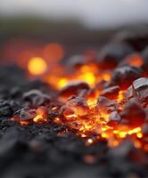 Lava flow creating a glowing landscape at sunset photo