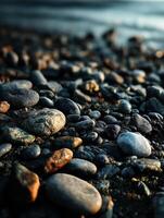 A close up of rocks on the beach photo