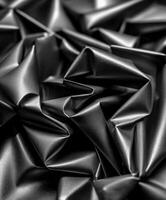 Black shiny fabric background photo