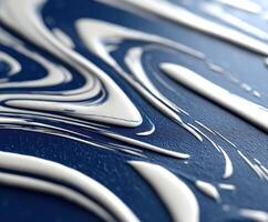 A close up of a blue and white marble surface photo