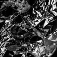 Black and white photo of a crumpled piece of aluminum foil