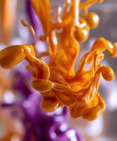 A close up of a liquid being poured into a container photo