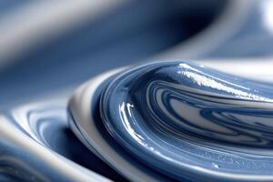 A close up of a blue liquid with white swirls photo