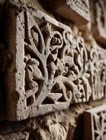 Ancient carvings on a stone wall photo
