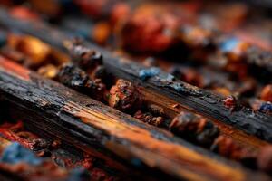 Close up of a wooden stick with paint on it photo