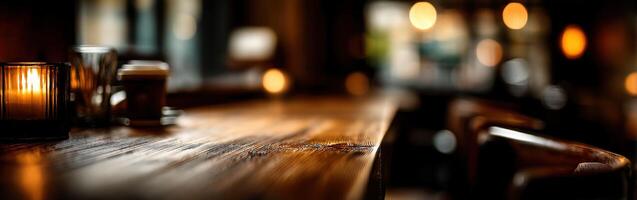 A table with candles and a glass of wine photo