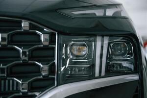 Front close up view of,, modern black car photo