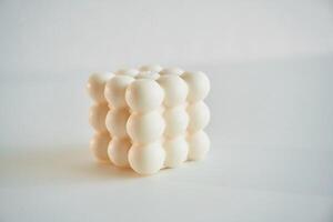Handmade beautiful decorative candle on ,the background photo