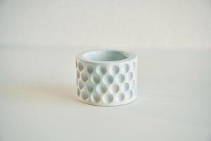 Handmade, beautiful decorative candle, on ,the background photo