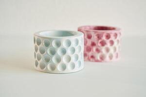 Capacity ,for candles on the creamy white surface photo