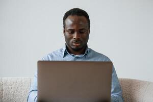 Freelancer ,is ,working at home by laptop photo