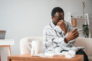 Sick, black man, is,, at home photo